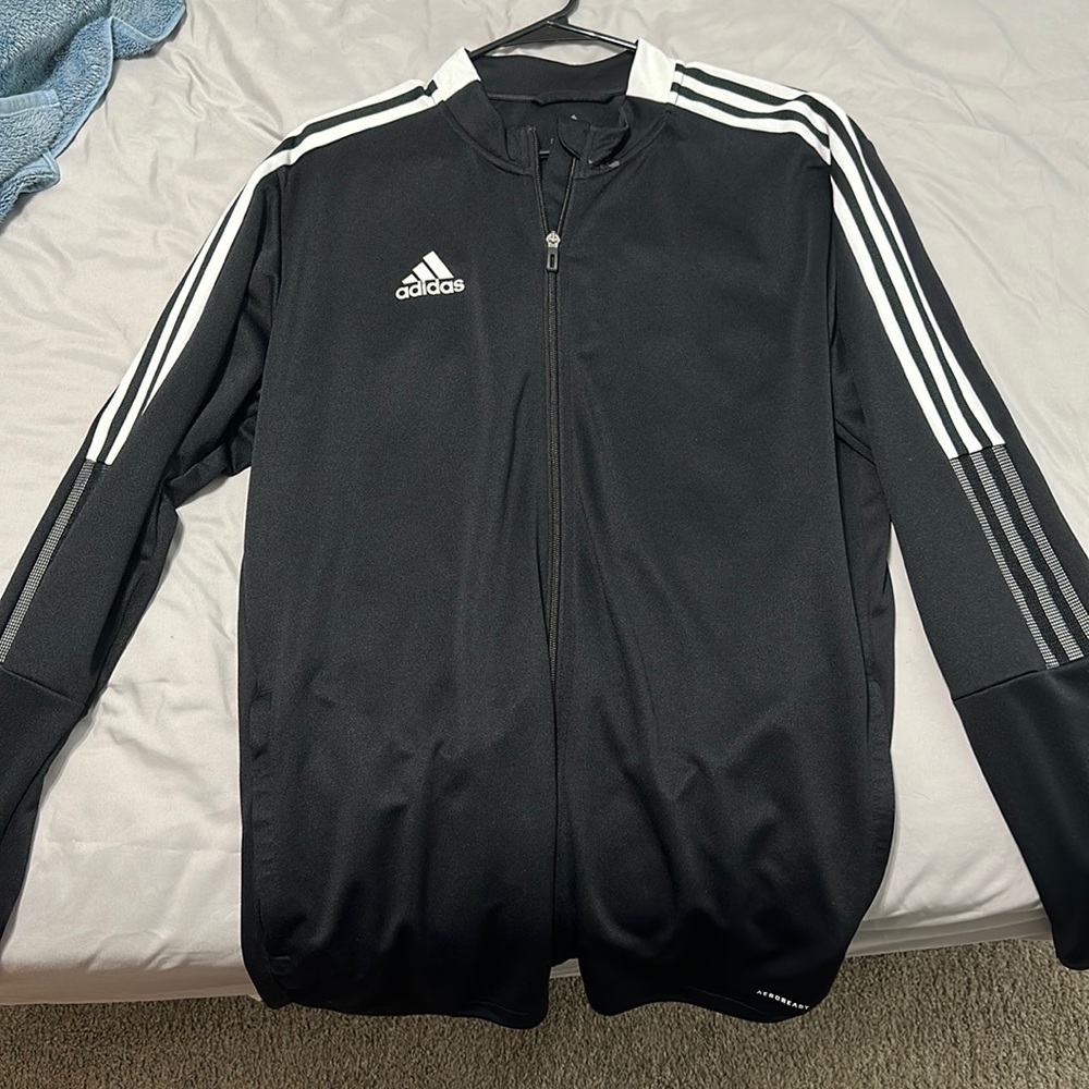 Adidas track suit jacket. Practically brand new. Hardly worn